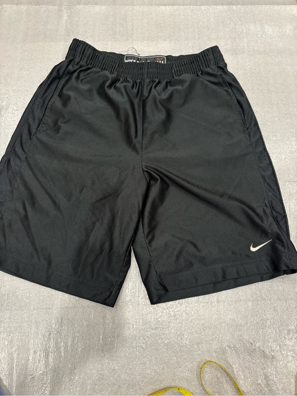 Nike Men’s Black Athletic Mesh Shorts with White Swoosh